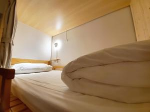 Letto o letti in una camera di On My Way Taitung Hostel