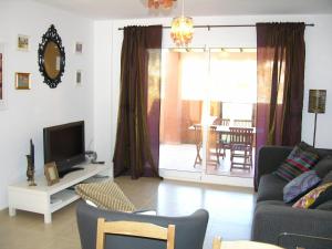 TV a/nebo společenská místnost v ubytování Albatros Playa 3 - 1207