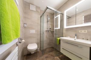 Koupelna v ubytování Hotel Sporthof Austria