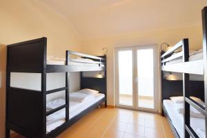 Postel nebo postele na pokoji v ubytování Casa Baleia - Praia e Piscina - 10 pessoas