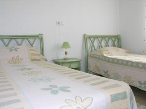Łóżko lub łóżka w pokoju w obiekcie Ribera Beach 3 - 1208