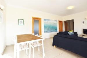 TV a/nebo společenská místnost v ubytování Casa Baleia - Praia e Piscina - 10 pessoas