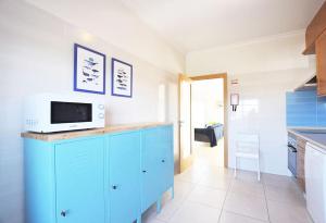TV a/nebo společenská místnost v ubytování Casa Baleia - Praia e Piscina - 10 pessoas