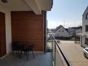Balkon lub taras w obiekcie Marina Jastarnia Apartamenty w budynku z Basenem
