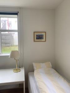 Postel nebo postele na pokoji v ubytování Mánagisting Guesthouse