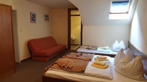 Cama ou camas em um quarto em Seegasthof zur Landeroith