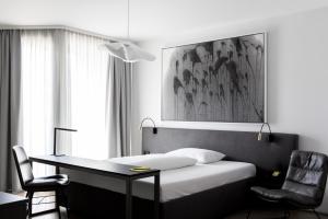 Postel nebo postele na pokoji v ubytování Lendhotel
