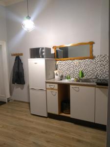 Kuchyňa alebo kuchynka v ubytovaní Hostel Staromiejski
