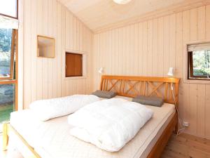 Postel nebo postele na pokoji v ubytování Holiday home Væggerløse CXII