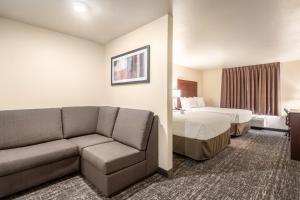 Voodi või voodid majutusasutuse Cobblestone Hotel & Suites - Andrews toas