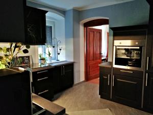 Kuchnia lub aneks kuchenny w obiekcie Villa Komposch - adults only