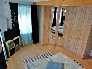 Łóżko lub łóżka w pokoju w obiekcie Villa Komposch - adults only