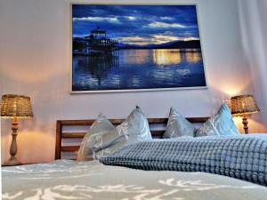 Łóżko lub łóżka w pokoju w obiekcie Villa Komposch - adults only