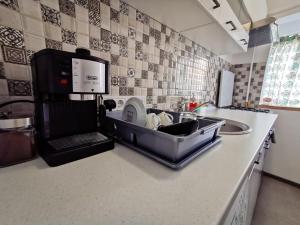 Una cocina o kitchenette en Apartment 48 Resita - self check in