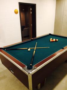 
A pool table at DAFT Hotel
