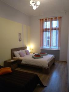 מיטה או מיטות בחדר ב-Hostel Staromiejski