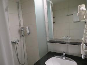 Koupelna v ubytování Hotel Klausenhof Flüeli