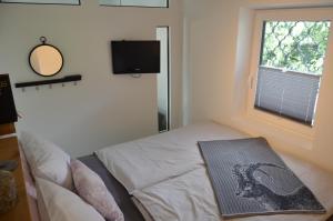 Posteľ alebo postele v izbe v ubytovaní Apartment Moore