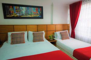 Postelja oz. postelje v sobi nastanitve Hotel Embajada Real