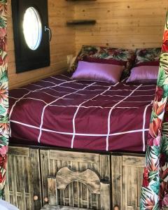 Кровать или кровати в номере Roulotte de Florette
