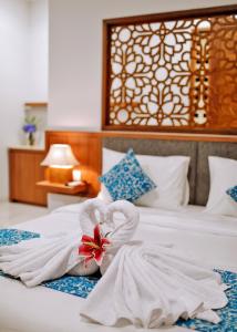 Een bed of bedden in een kamer bij Mahana Living