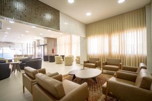 Posezení v ubytování Hotel Confiance Barigui
