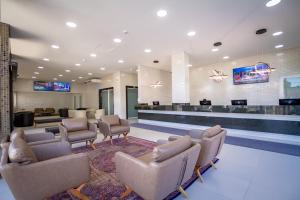 TV a/nebo společenská místnost v ubytování Hotel Confiance Barigui