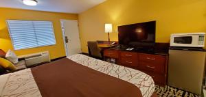 Kuchyň nebo kuchyňský kout v ubytování Apple Inn Motel