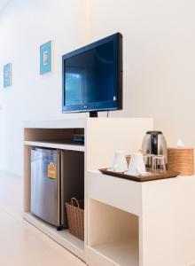 Η κουζίνα ή μικρή κουζίνα στο The C Samet Beach Resort SHA Plus