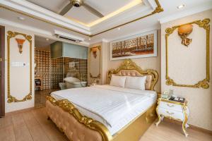 Giường trong phòng chung tại HANZ Mimosa Hotel