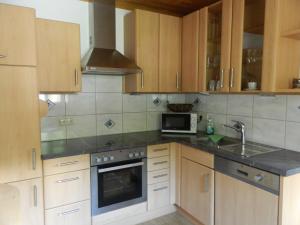 Kuchyň nebo kuchyňský kout v ubytování Egglmeier's Ferienwohnung + 9 fotografií