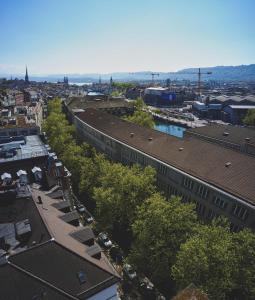 an aerial view of a city with buildings and trees at Hotel Bristol Zurich in Zurich