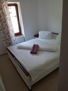 A bed or beds in a room at Apartmany St. Maria