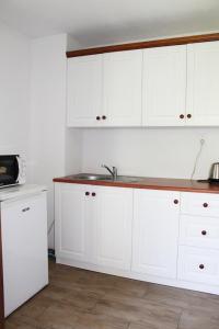 A kitchen or kitchenette at Apartmany St. Maria