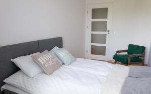 Posteľ alebo postele v izbe v ubytovaní Nest Centrum Toruń