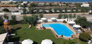 an overhead view of a pool at a resort at Hotel Corallo in Fregene