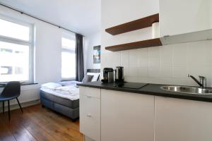 Arthouse Apartments am Eigelstein tesisinde mutfak veya mini mutfak