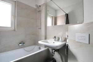 Ένα μπάνιο στο Arthouse Apartments im Belgischen Viertel