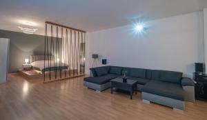 A seating area at Cinema Zeus Studios - by Avelink