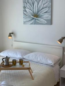 Postel nebo postele na pokoji v ubytování Apartments Ema