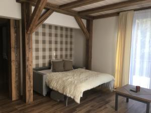Postel nebo postele na pokoji v ubytování Apartmány POCO LOCO