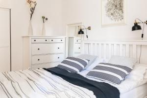 Postel nebo postele na pokoji v ubytování Apartamenty w Świnoujściu