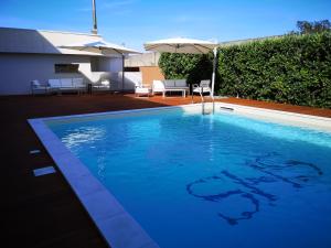 Bazén v ubytování Sicilia Hotel Spa nebo v jeho okolí