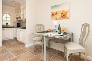 Kuchyň nebo kuchyňský kout v ubytování Appartement Lycka + 10 fotografií