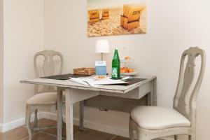 Nápoje v ubytování Appartement Lycka