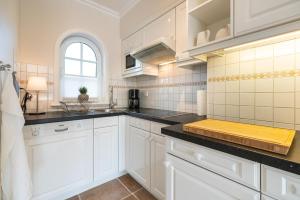 Kuchyň nebo kuchyňský kout v ubytování Appartement Lycka
