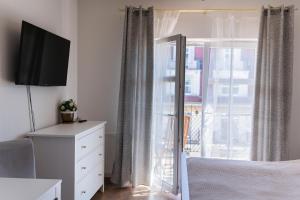 Postel nebo postele na pokoji v ubytování Apartamenty w Świnoujściu
