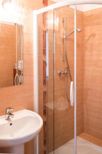 Koupelna v ubytování Apartamenty w Świnoujściu + 31 fotografií