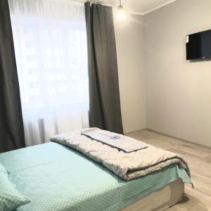 Кровать или кровати в номере Belvederska apartment 2