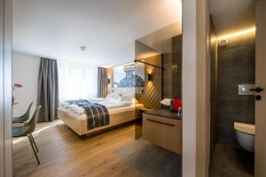 Ένα ή περισσότερα κρεβάτια σε δωμάτιο στο Hotel- Restaurant Krone
